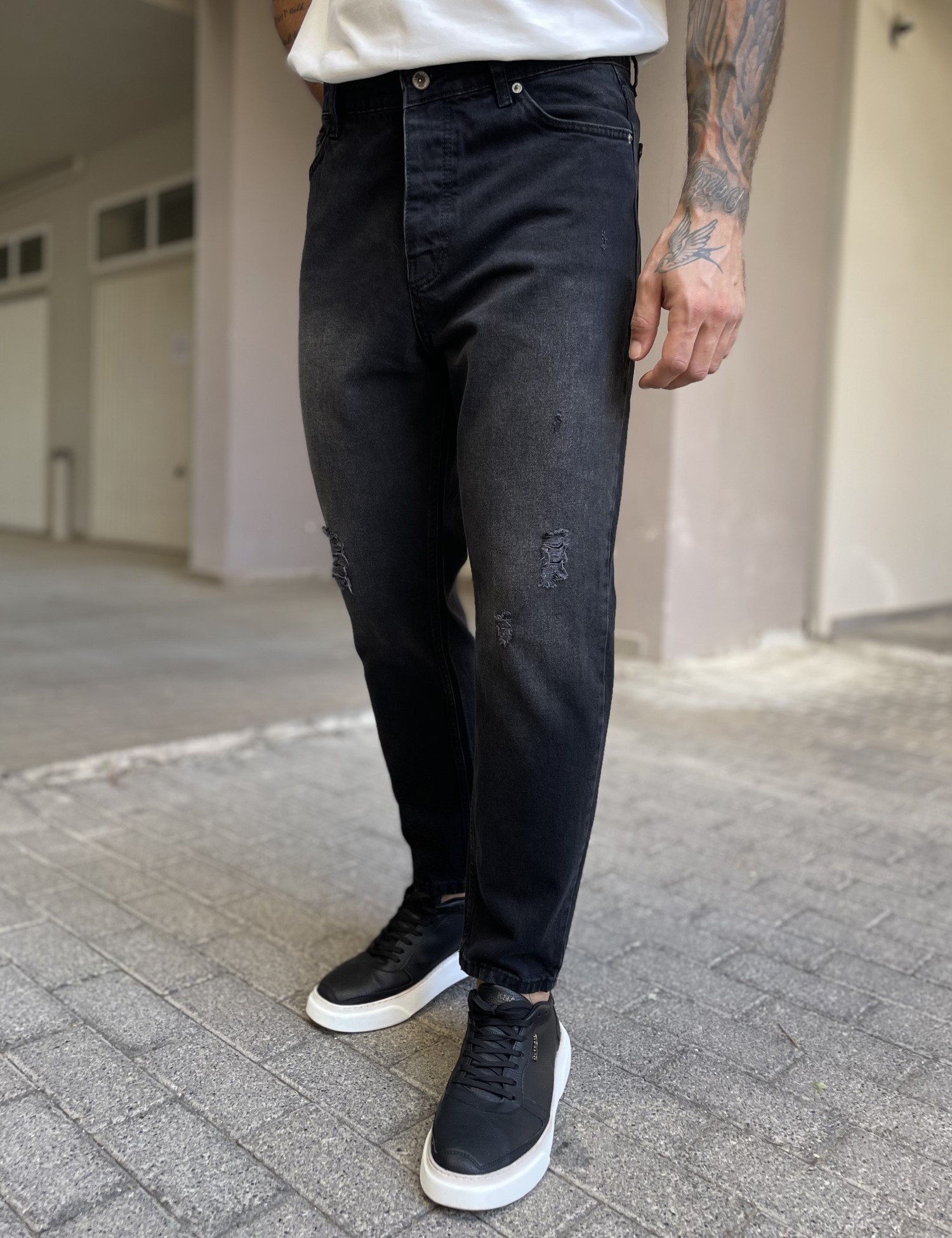 Ανδρικό μαύρο ξεβαμμένο loose τζιν πεντάτσεπο με φθορές WE2302 φωτογραφία